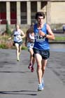 Thomas Straughan (Morpeth) finishing the Tyne Bridge Harriers Exhibition Park 5k, Newcastle.
